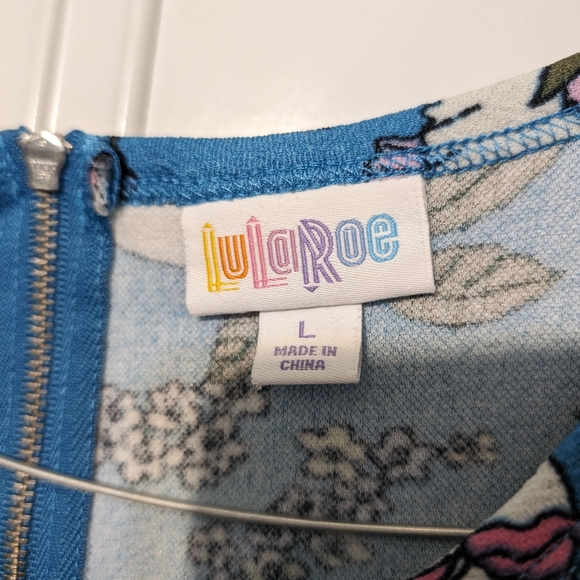 Light blue floral short sleeved dress with pockets ๐ธ๐ comfy stretch fit flare - Picture 8 of 9